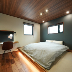 洗練された落ち着きのある寝室