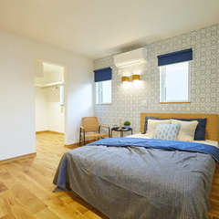 アクセントクロスがオシャレな印象となるこだわりの寝室