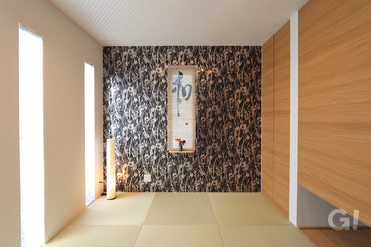 注文住宅の琉球畳が広々とモダンな印象となる美しい和室スペースの写真