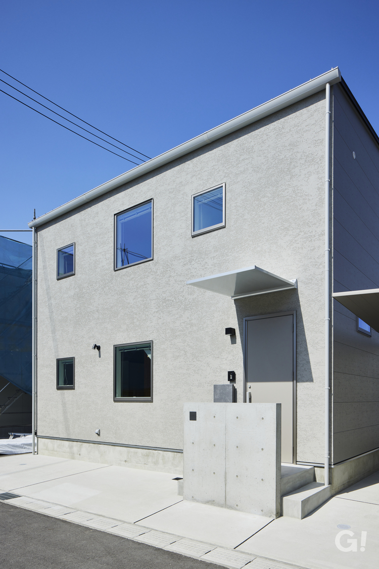 デザイナーズ住宅の上品なアースカラーが美しいキューブ型外観のお家の写真