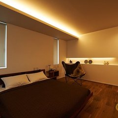 間接照明で寛ぐ寝室