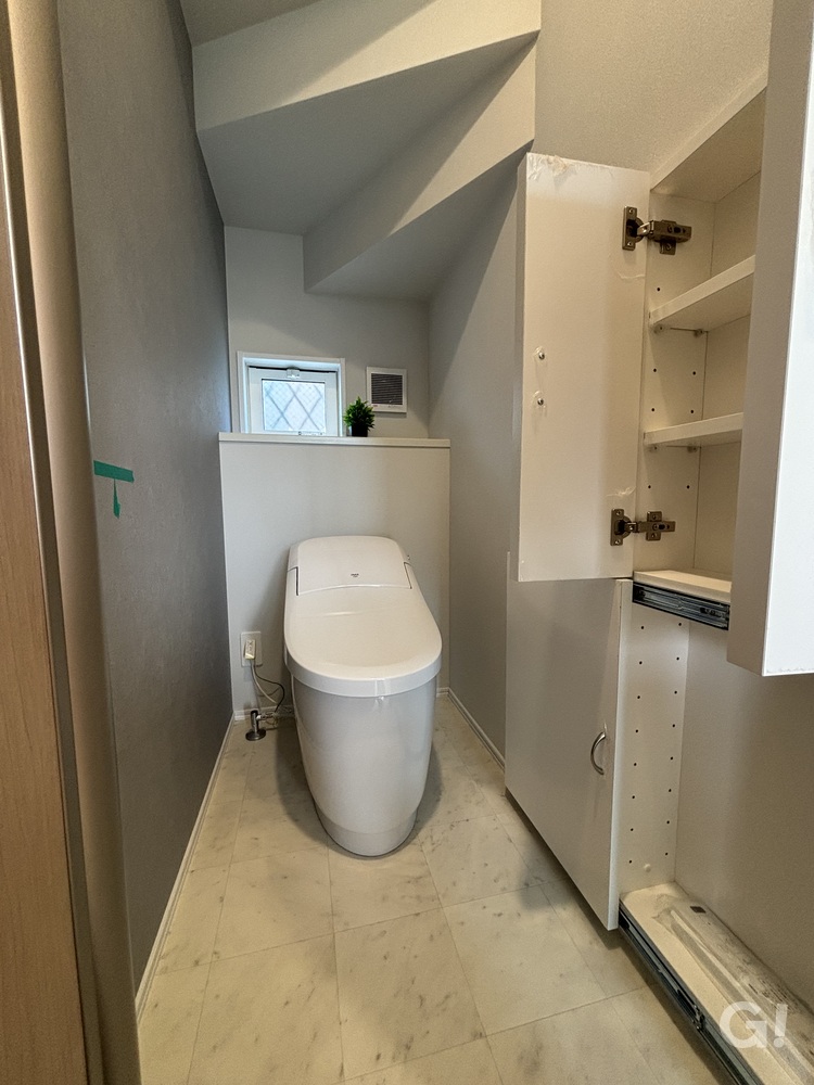 自社オリジナル収納付きのトイレの写真